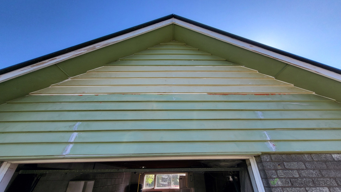New weather boards on garage.