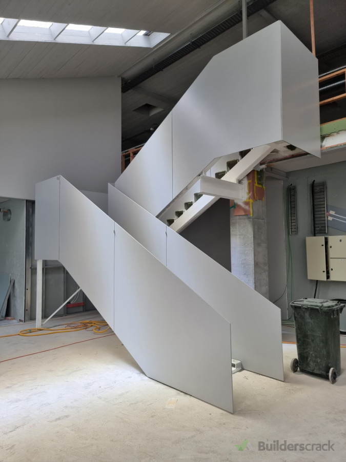 16mm mild steel stair panels weldered together to stair string.