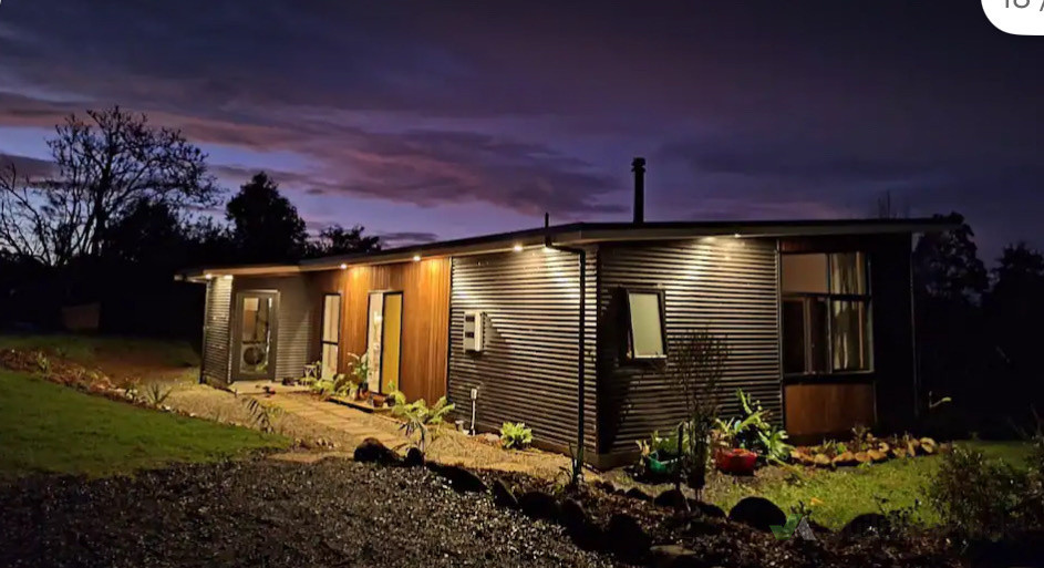 Entrance of house, colour steel and cedar cladding combo.