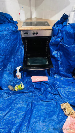 Cover around oven to save drawers from chemicals