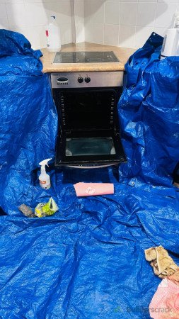 Cover around oven to save drawers from chemicals