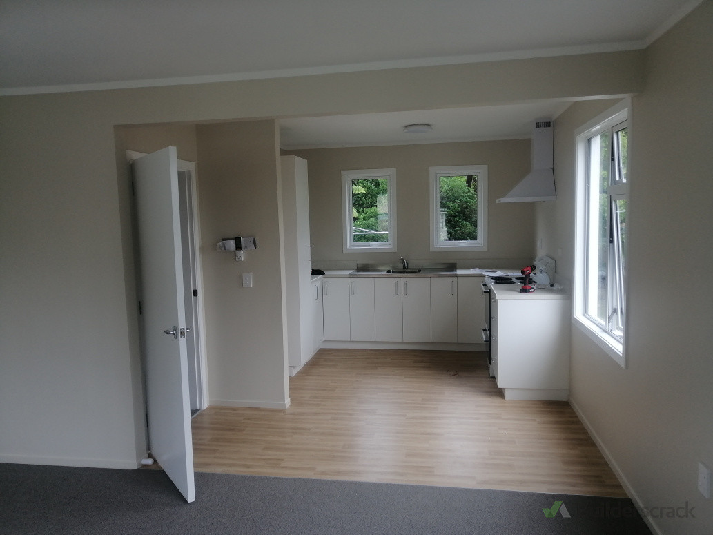 Removed a load bearing wall and fireplace to create an open-concept flow with the kitchen