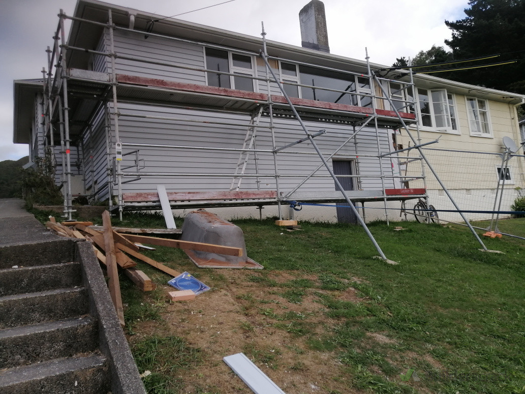 Installed new windows and reclad the exterior with bevel-back weatherboards.