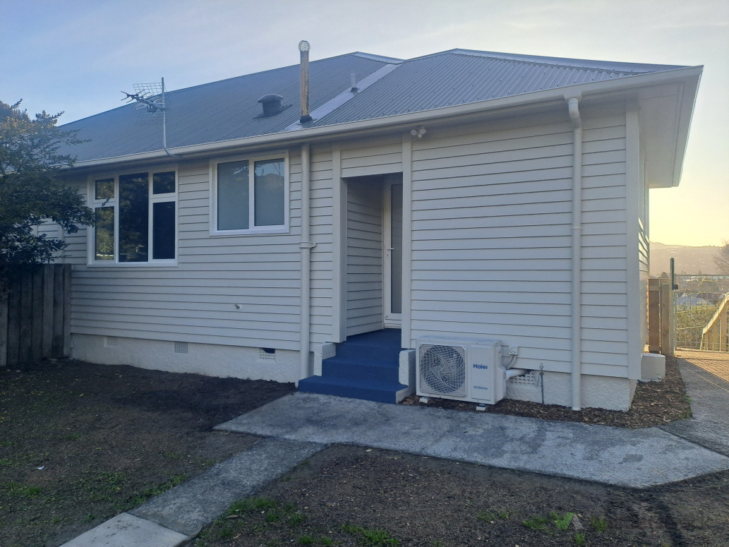 Installed new windows and reclad the exterior with bevel-back weatherboards.