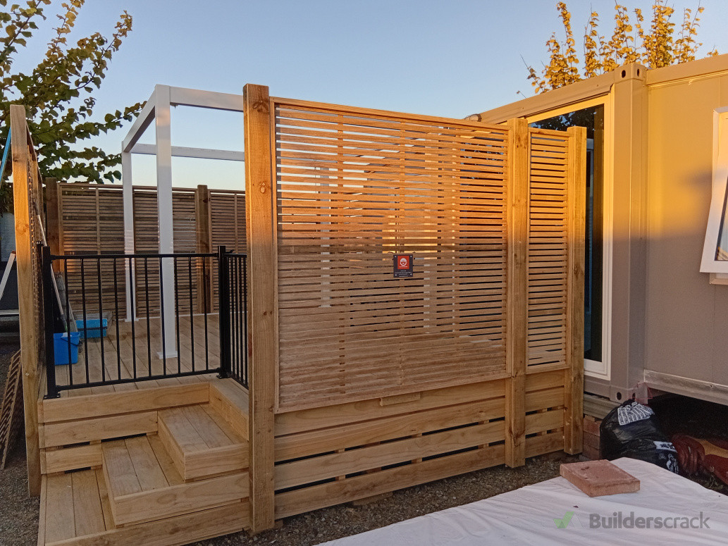 Stairs,  deck , trellis and gate.
