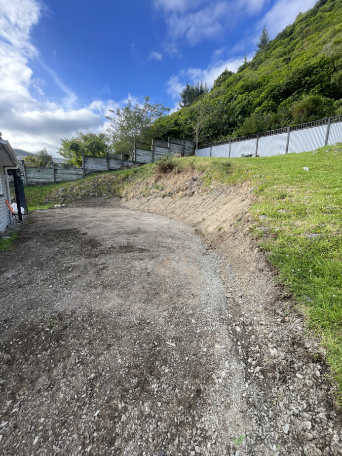 Driveway dig out and reshape.
