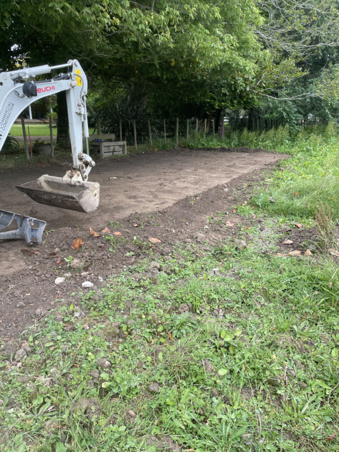 Dig out and base course to create a dry area for horses to stand. Clients request.