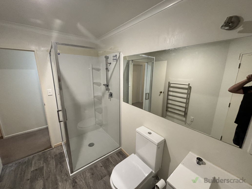 Bathroom update, including new shower and large new mirror