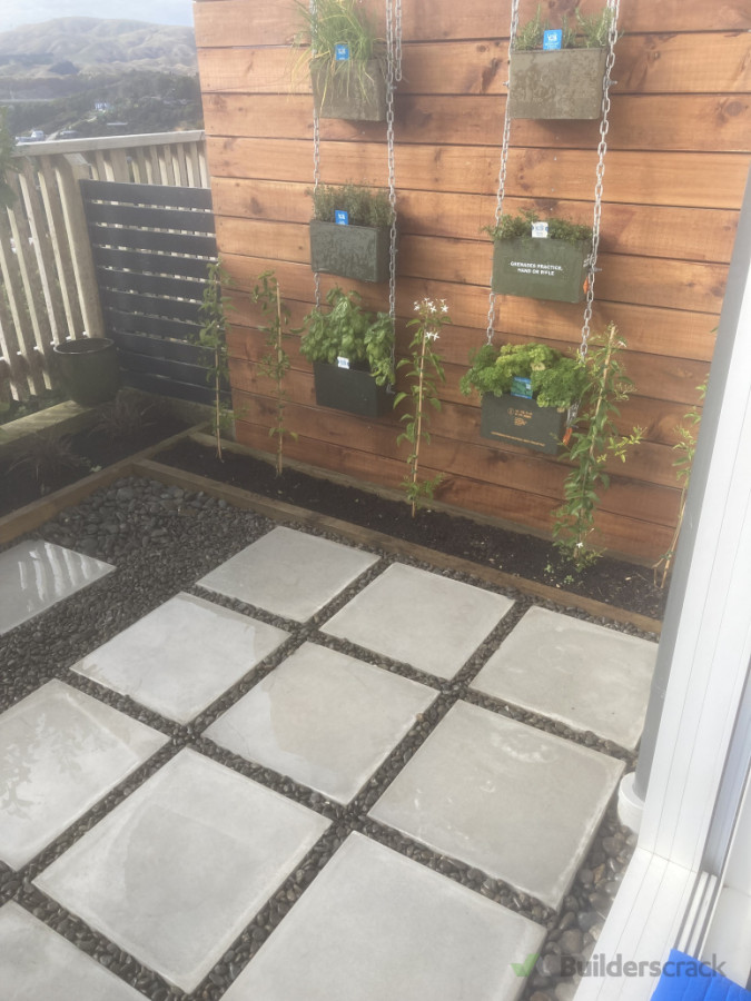 paving and Riverstone with hanging herb  ammunition boxes