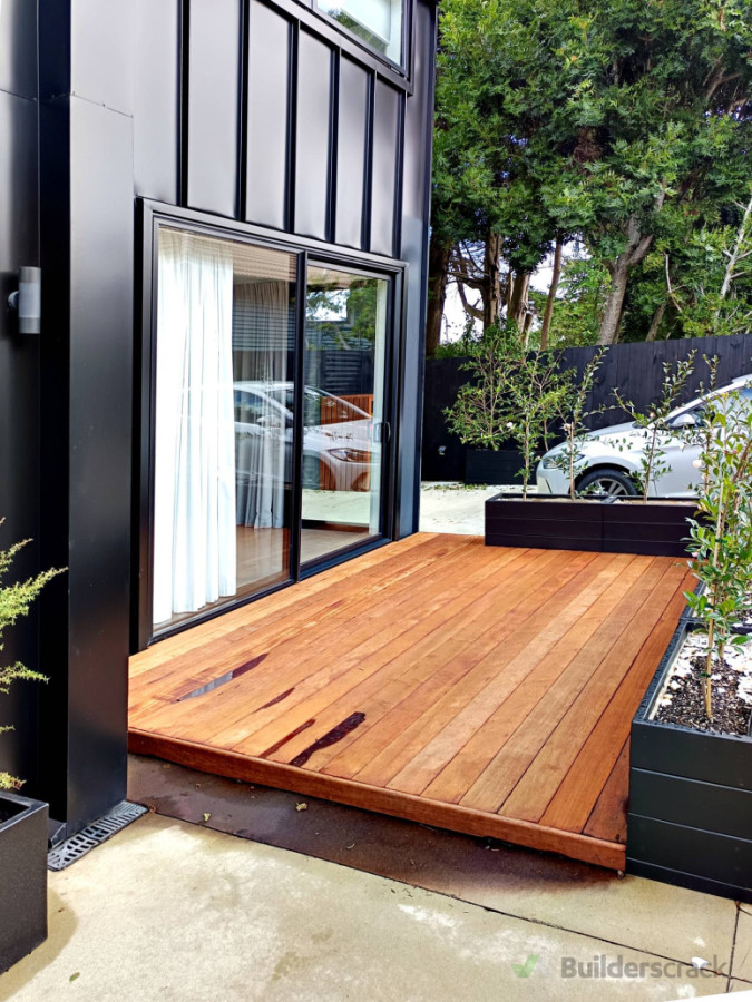 i suggested Kwila for the deck and pine for planters