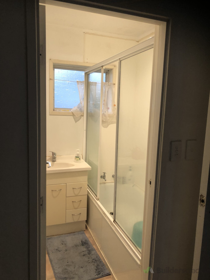 Before - very tired, leaking and old bathroom