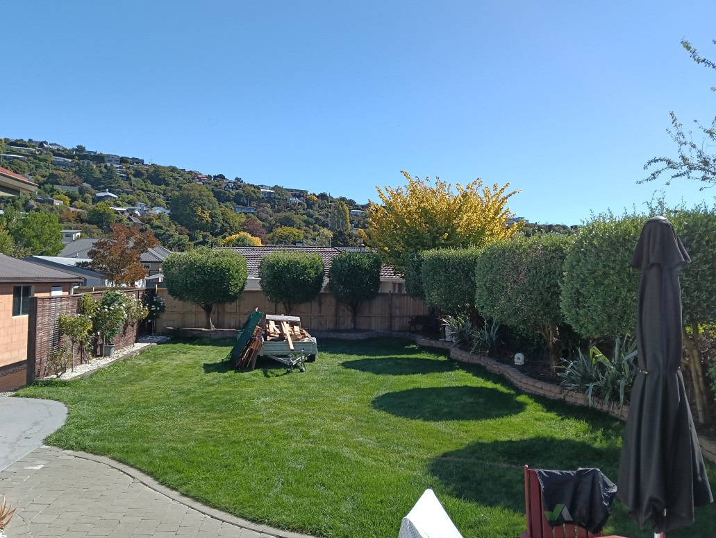 Build retaining wall, installed irrigation system,planted Olives, laid pavers built and installed Trellis, levelled back section dug soak pit and replayed lawn. Installed new fence