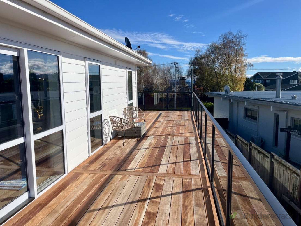 Kwila second story deck with home plus glass balustrade