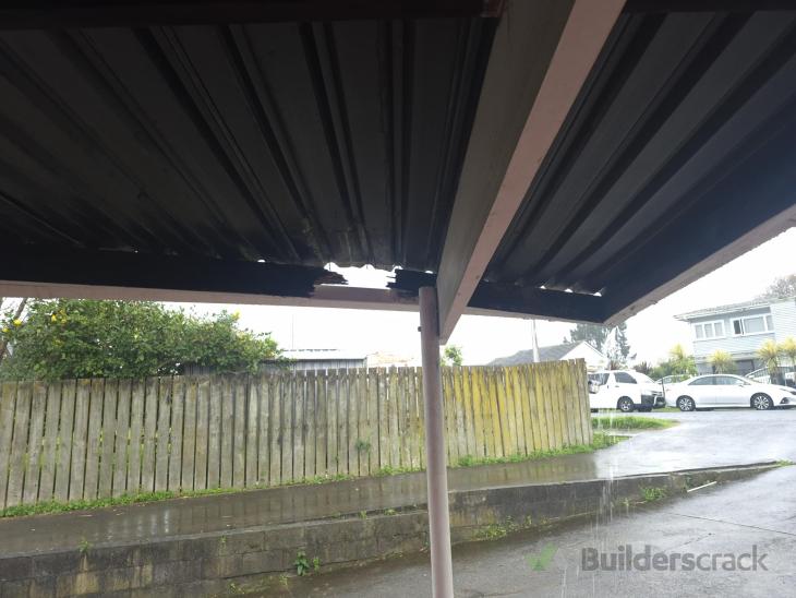 Rotten timber attached to carport gutter (#1113993) | Builderscrack