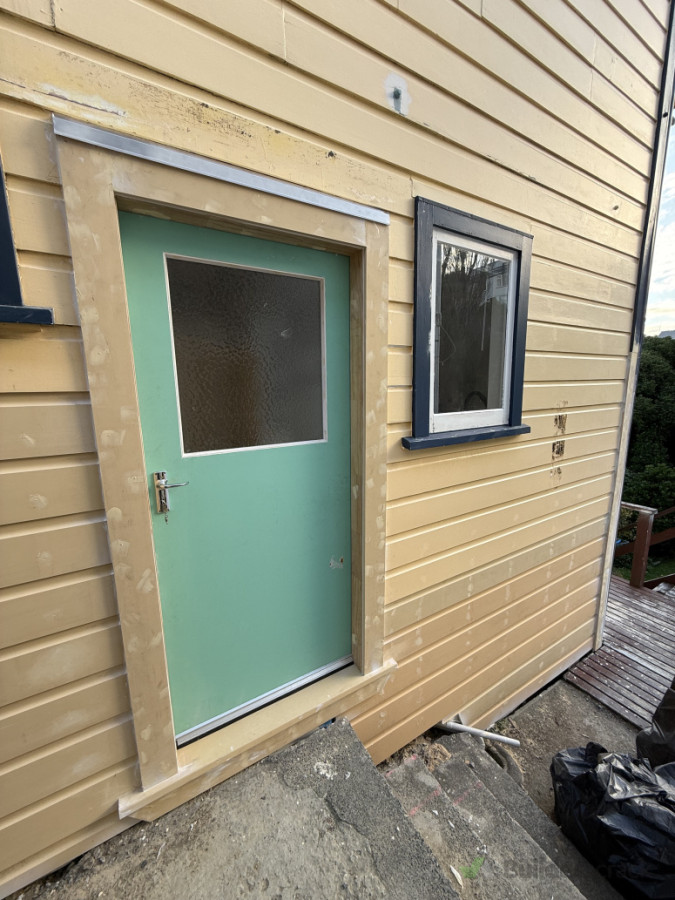 Weatherboards repairs/ new door/flashing and trims