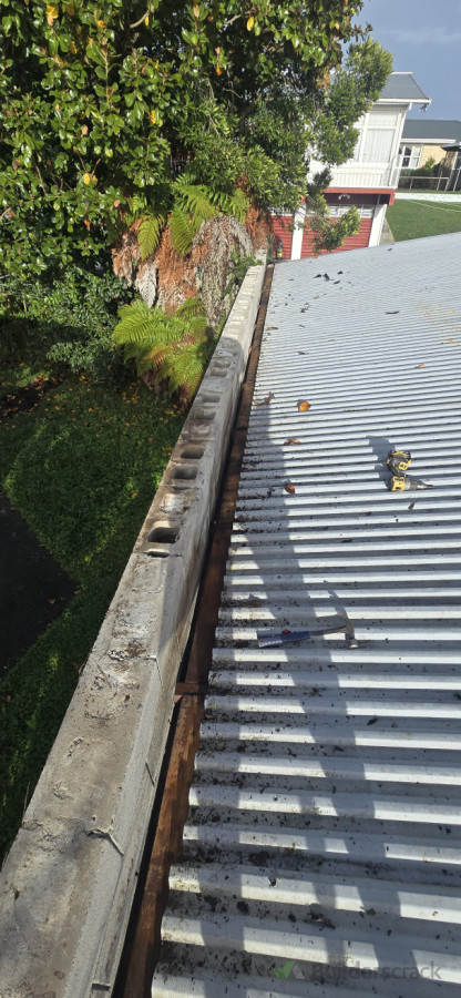 Removal of rusty internal gutter in hamilton