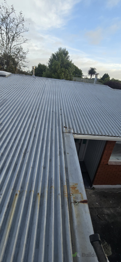 Roof repairs to bring to roof code