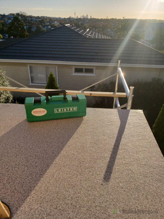 Dek-Master Vinyl waterproofing membrane on deck.