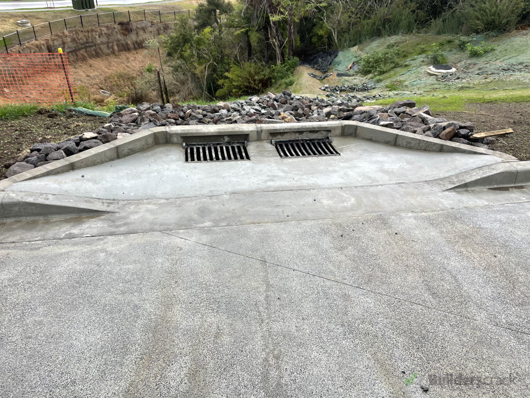 Double catchpit install with kerbing blocks and surround, rip rap overflow