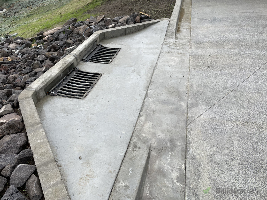 Double catchpit install with kerbing blocks and surround, rip rap overflow