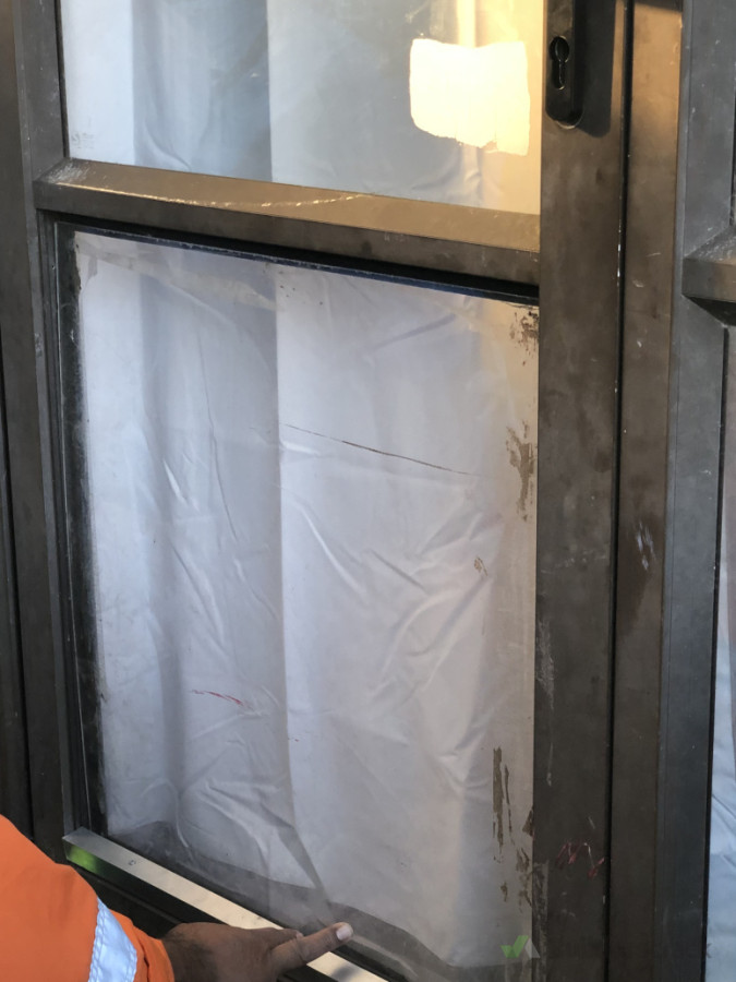 Before shot of aluminium door with missing beads