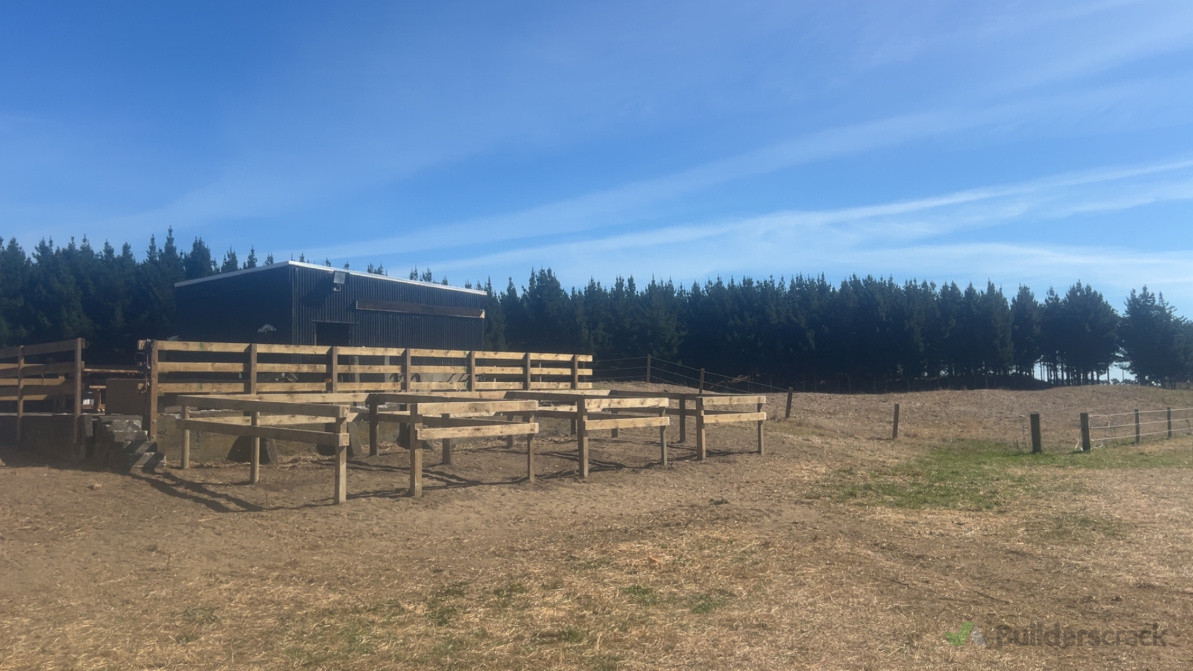 horse yards and hayshed built with post and rail around hayshed