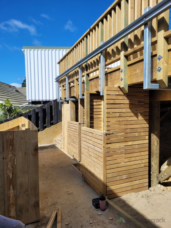 Double engineered  car deck with bin storage