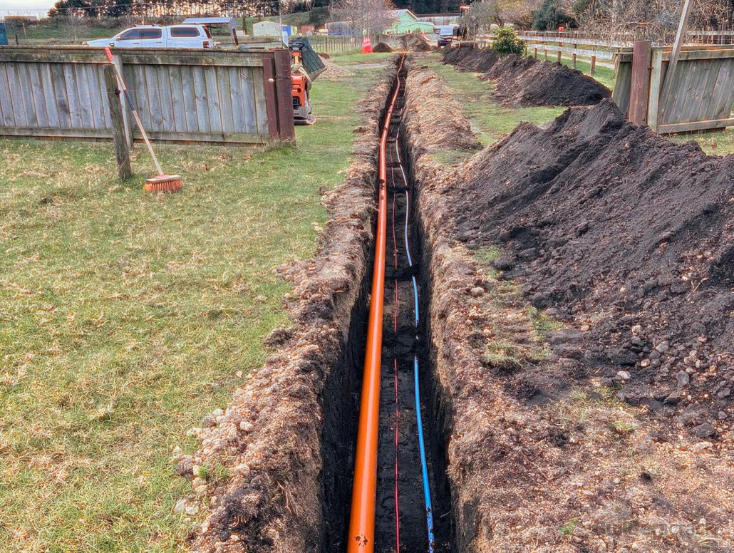 Installation of power, telecommunications and water for a subdivision.