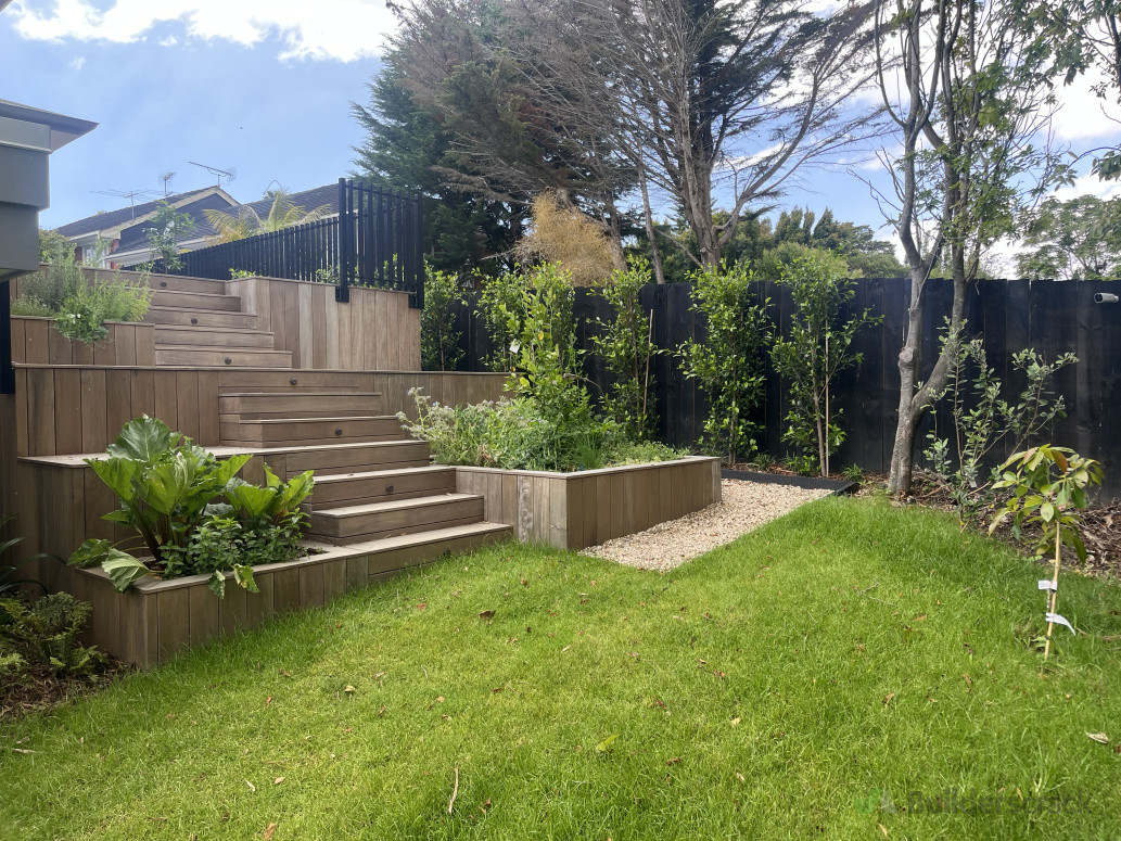 Decking, planter boxes, path formations, lawn install and planting.