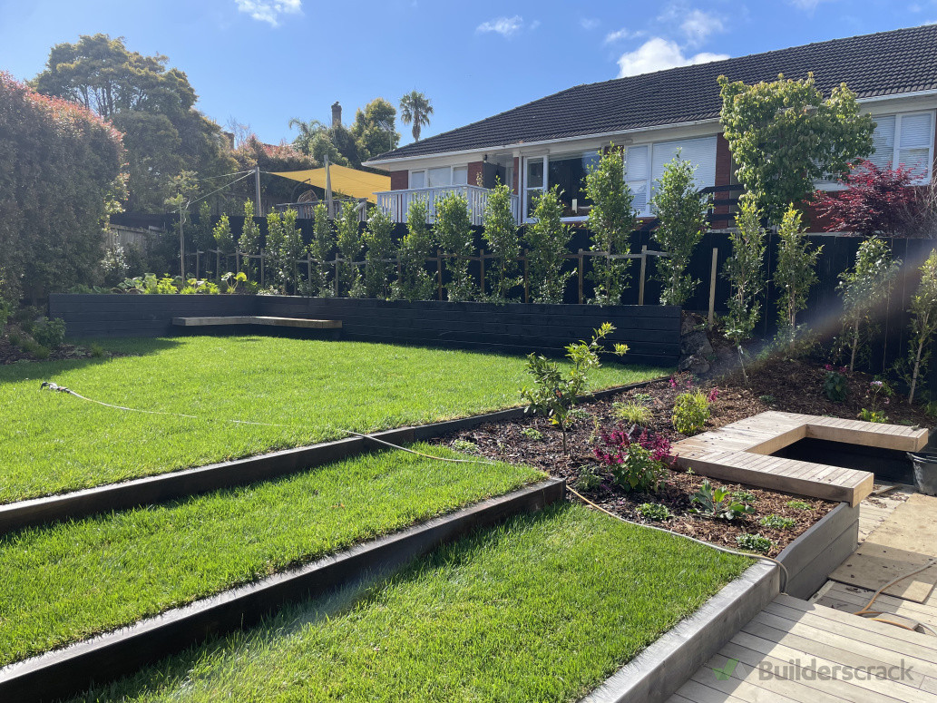 Complete garden overhaul. Raise lawn area up by 4 metres, new lawn, retaining, garden prep, planting, decking, hardwood floating seats.