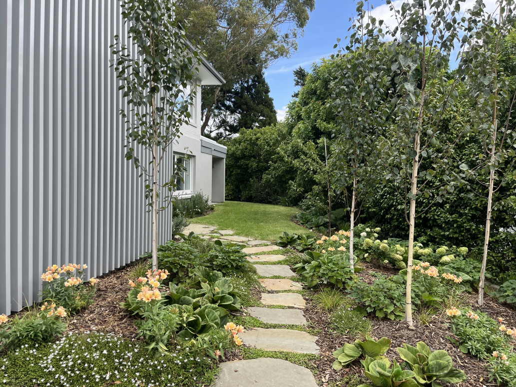 Paradise stone path, garden formation, lawn prep and install, planting.