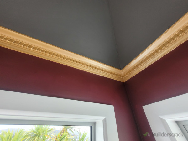 Detailed gold painted ceiling coving for a art deco look