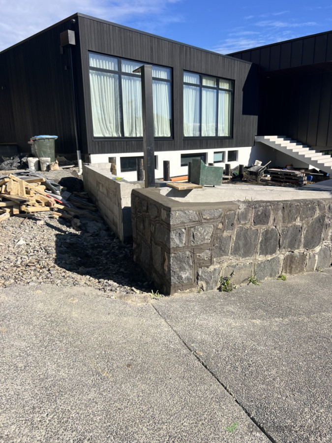 Extending the stone wall.