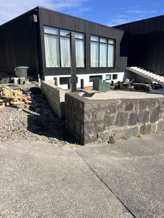 Extending the stone wall.