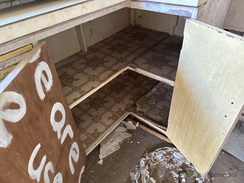 Paper Backed Vinyl Sheeting in Kitchen Cupboard