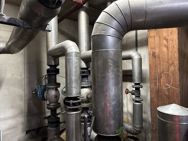 Presumed pipe insulation below metal covers