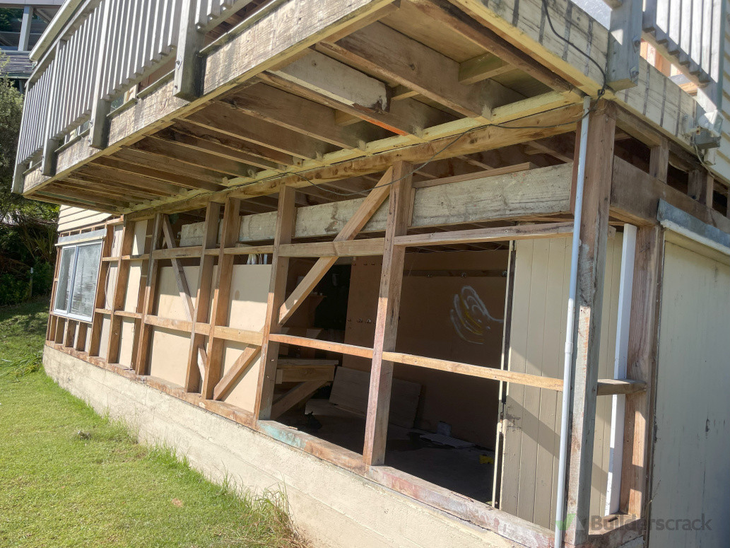Removed fibre cement cladding and deck lining from ground floor