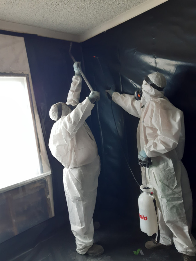 Asbestos coated ceiling removal