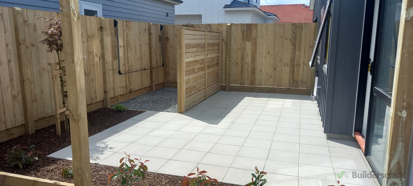 Paved patio, fencing, clothesline installation, planting