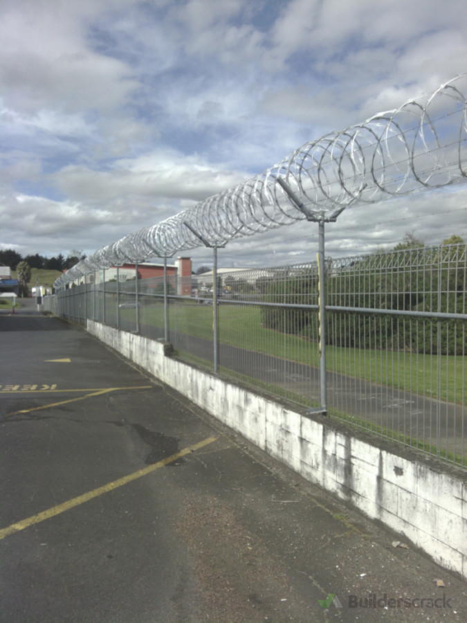 Coils of razor wire