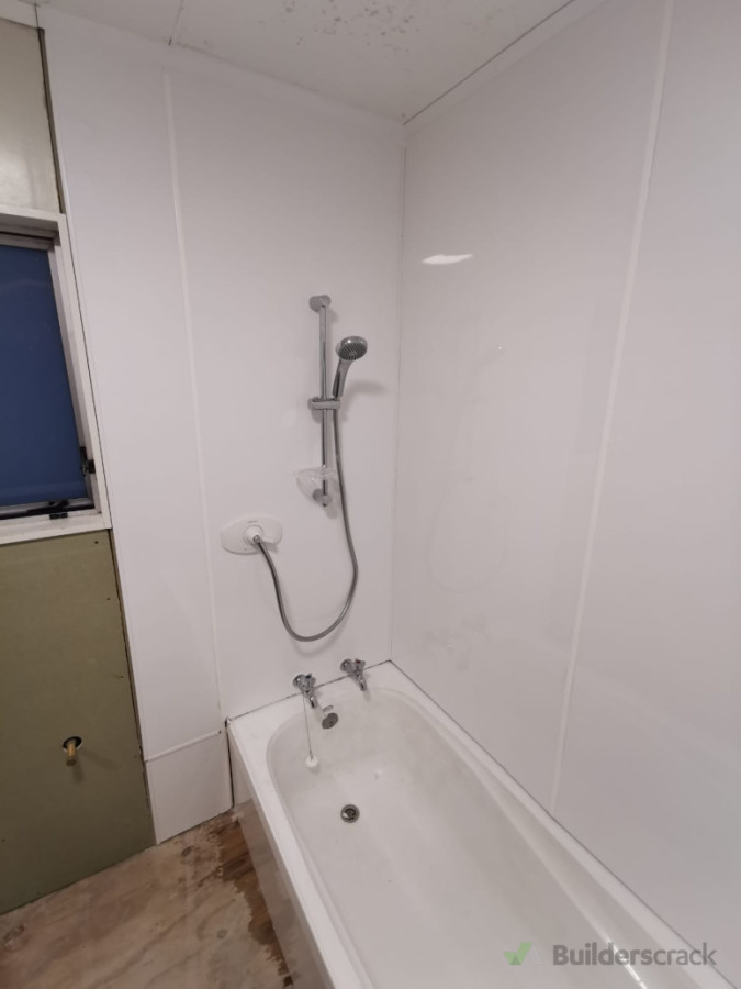 Bathroom Renovation With New Linings Around the Bath