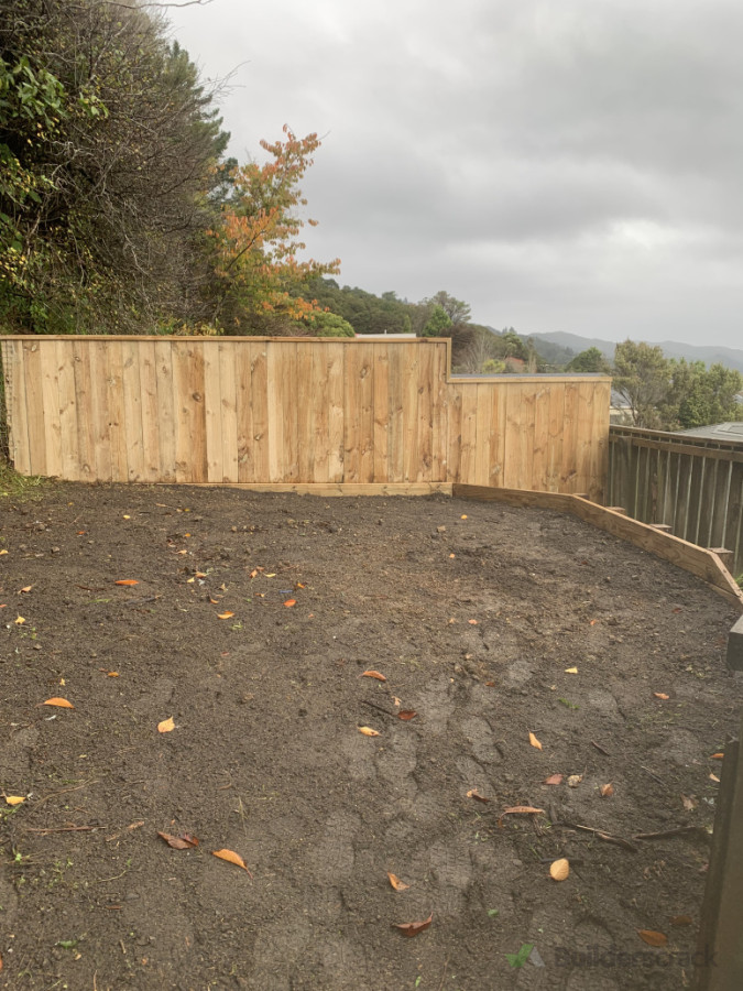 Fence and retaining wall combo recently built.