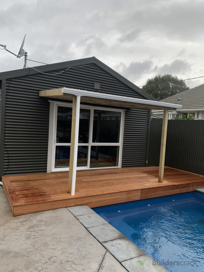 Ranch slider replacement, deck and lean to roof construction from recent project