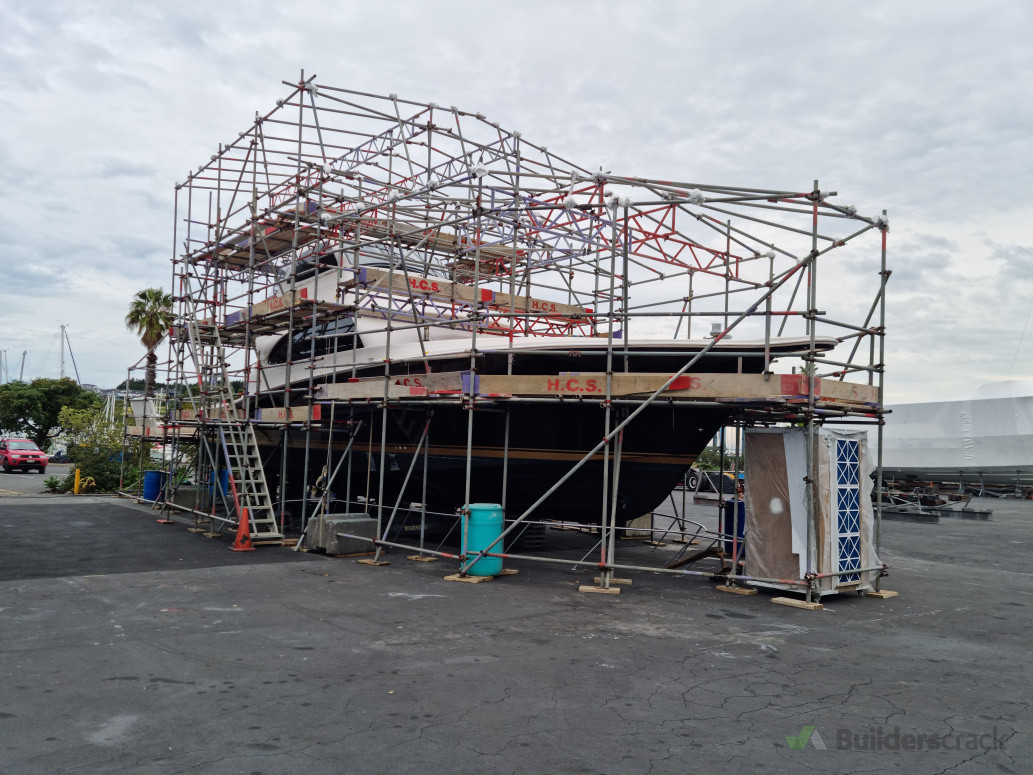 Boat on hardstand at Gulf Harbour Marina