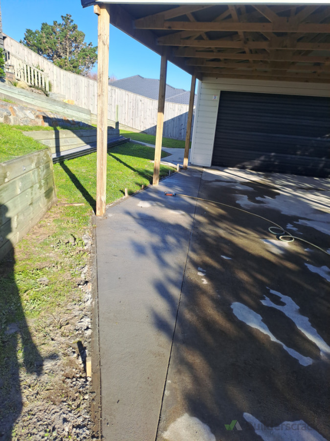 Carport extension slab with broom finish