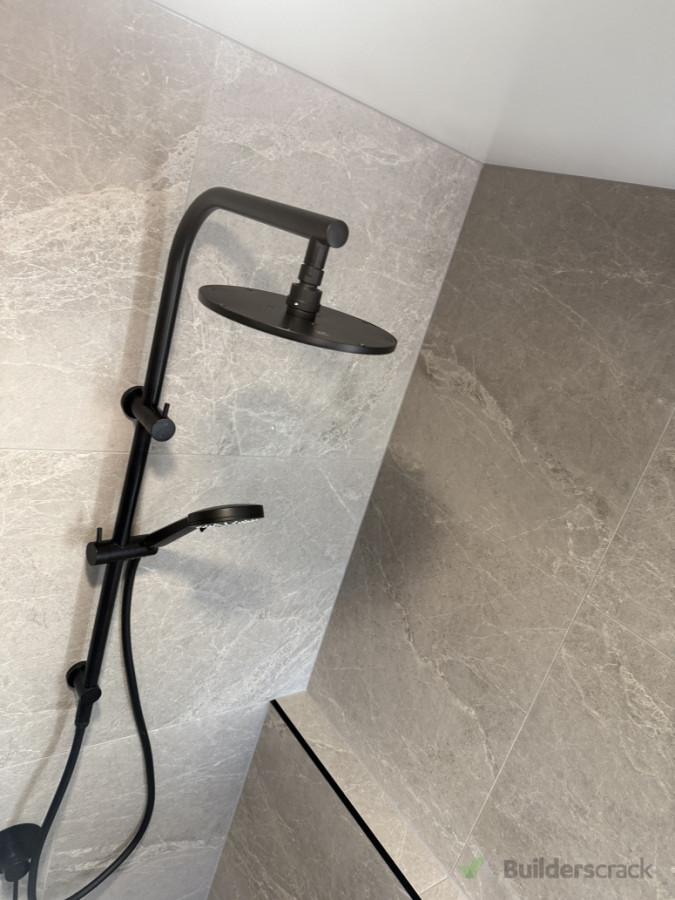 Tile shower with monsoon head