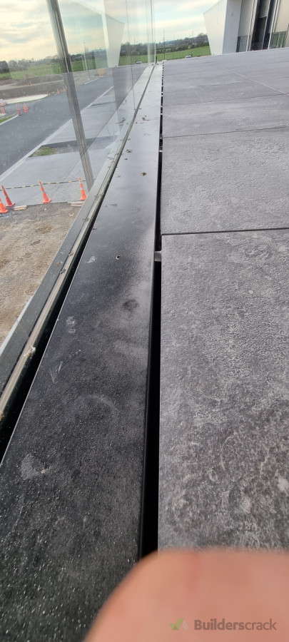 application of deck jack. Special dry technology  (size 600x600  and 20mmtile thickness)