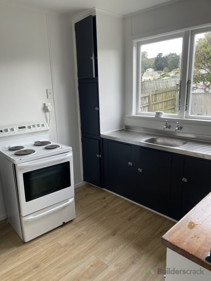 New sheet vinyl install in rental property renovated kitchen