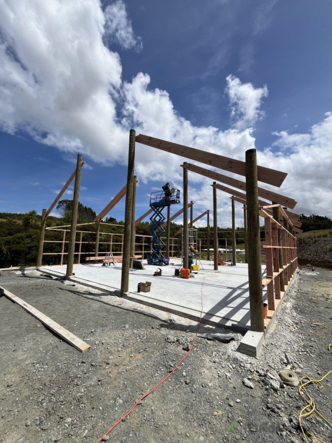 Architecturally designed pole shed going up — from site cut to concrete pour to joinery install, this project is a great showcase of our full capability across building and earthworks.