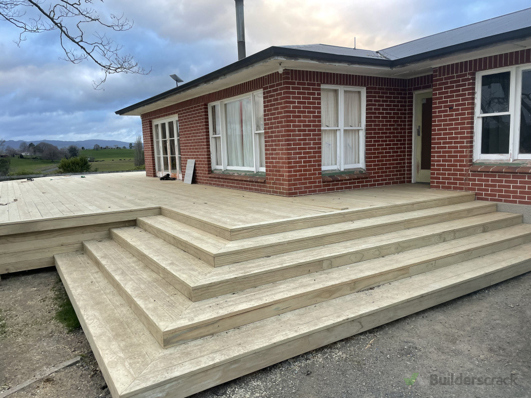 Long tread stairs up to the Farmhouse for both access and seating